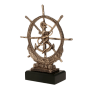 Statuetka odlewana RTY1030/BR w kolorze brązu z motywem koła sterowego, kotwicy i liny. Model na ciemnej podstawie sprawdzi się jako nagroda, wyróżnienie lub podziękowanie na regaty, zawody i wydarzenia żeglarskie. Miejsce na tabliczkę z nadrukiem.