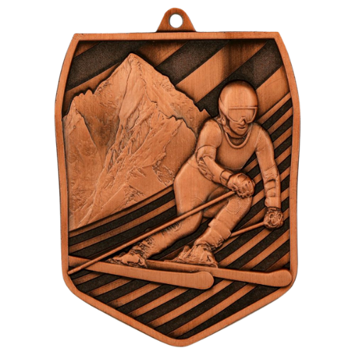 Brązowy medal odlewany zjazd narciarski MD8055/B – odlewany medal w kształcie wielokąta 78x61 mm z motywem narciarza na tle gór. Wykonany z metalu. Idealna nagroda na zawody narciarskie i turnieje zimowe.